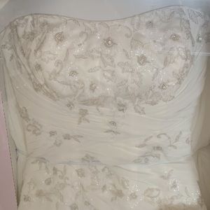 Gently used wedding gown with train